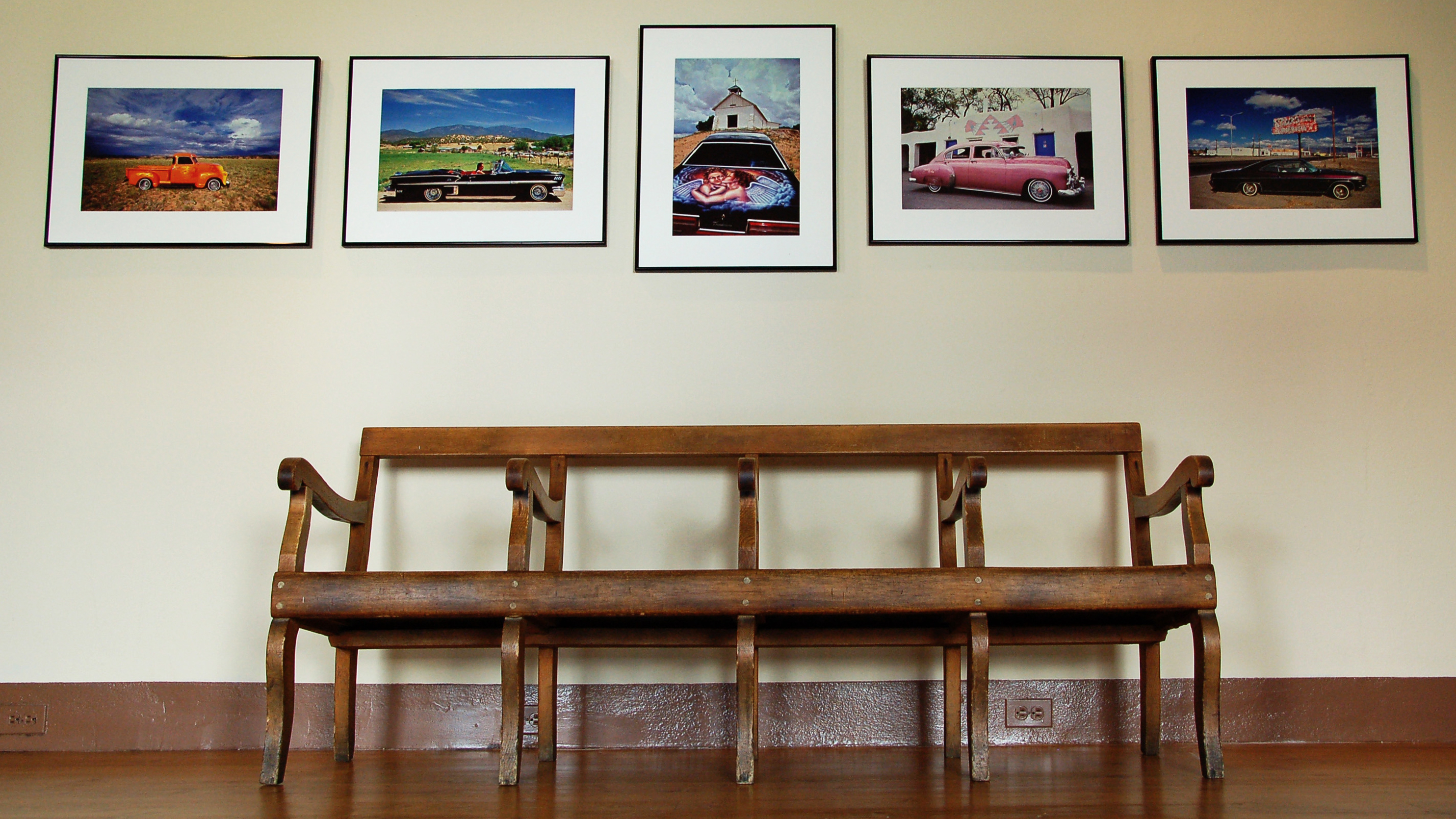 Wooden bench in the Palace of the Governors. Photo by Hannah Abelbeck